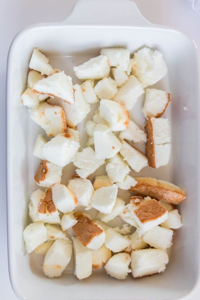 a white container filled with marshmallows on top of a table