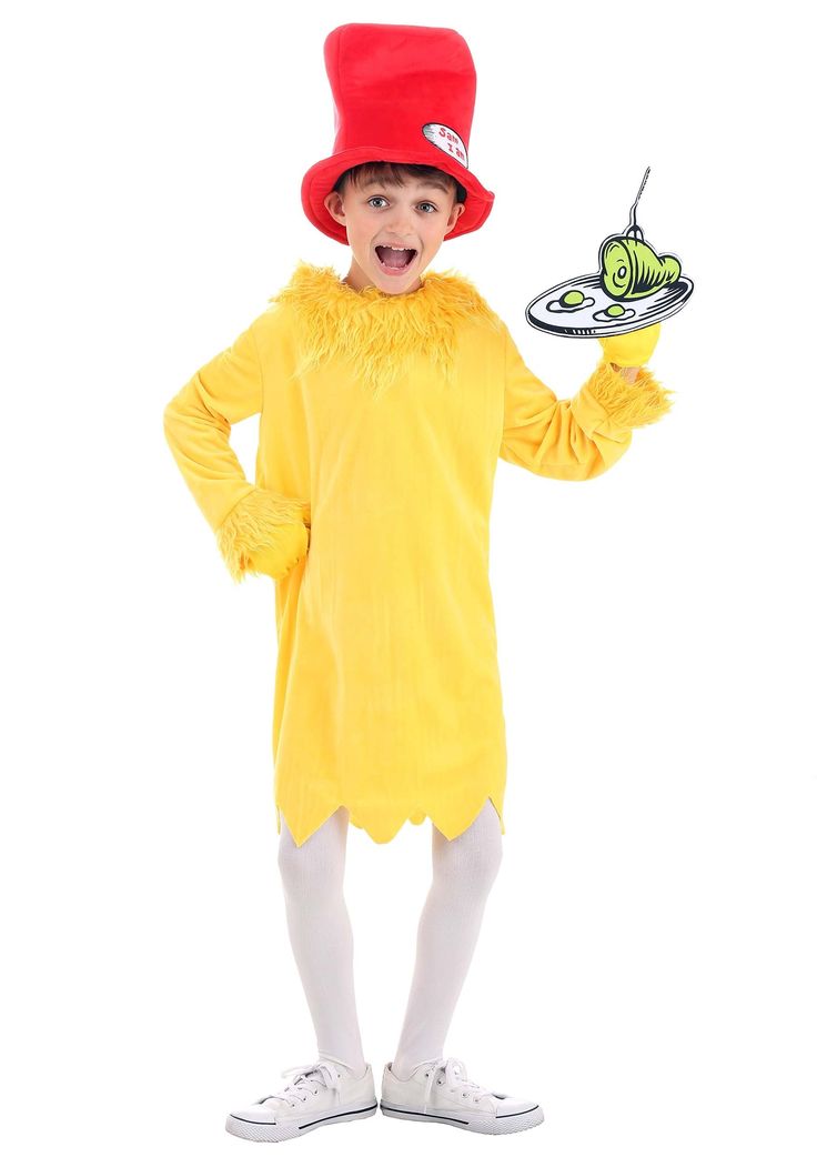 a little boy dressed in a yellow chicken costume and holding a plate with a green bug on it