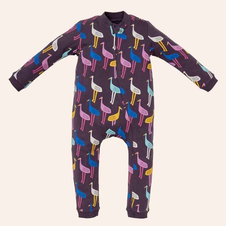 This will be your little one’s favorite outfit. It’s made in super soft organic cotton jersey with a bit of stretch for added ease and comfort. Our selection of bold and graphic prints can be worn out and about, or comfortably to naptime or bedtime. A full length zipper closure makes dressing easy. 95% Organic Cotton/5% Spandex Multicolor Cotton Graphic Print Sleepwear, Playful Organic Cotton Onesie For Playtime, Unisex Cotton Onesie For Loungewear, Playful Multicolor Printed Onesie, Playful Cotton Onesie For Fall, Playful Organic Cotton Tops For Playwear, Playful Fall Cotton Onesie, Multicolor Cartoon Print Onesie For Playwear, Cotton Onesie For Playtime In Fall