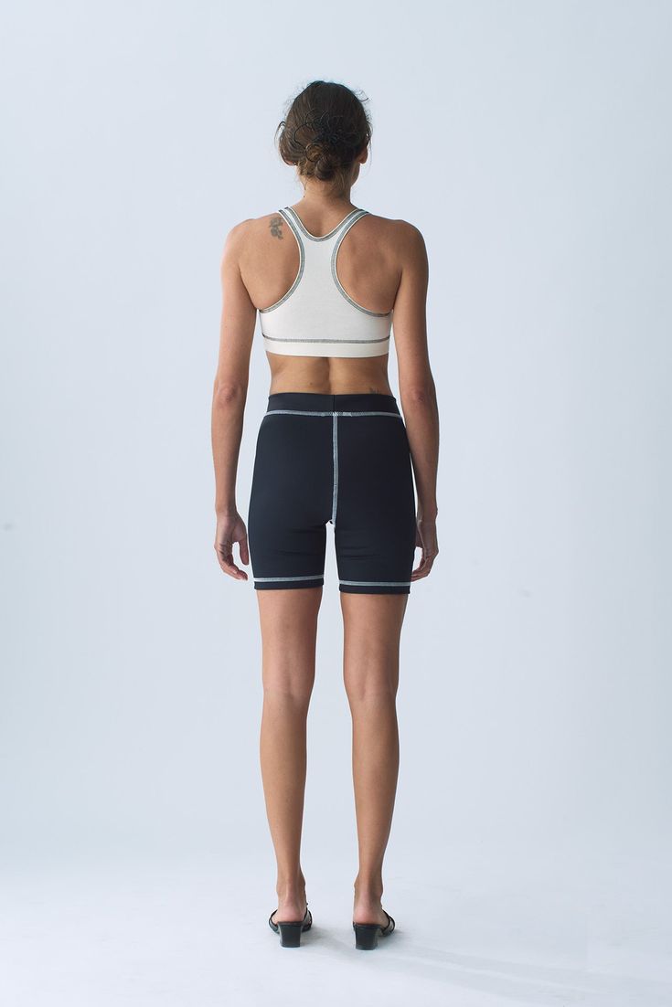 Our Organic Cotton Sport Bra provides full coverage, comfort and support for all activities. Finished with a racer back and 1 1/4 inch encased elastic hem. The Organic Cotton Sport Bra is manufactured in New York City. Fit notes – The Organic Cotton Sport Bra fits true to size, we recommend to take your normal size in a bra or sports bra style. Please follow measurements below to understand sizing. All measurements are in inches before stretch. Recommended Bra Sizing Across Chest Lying Flat (Pit Technical High-stretch Activewear For Sports Events, Padded High Stretch Sports Bra For Training, Sporty Nylon Activewear For Sports Events, Sporty Racerback Activewear With Built-in Padding, Supportive Padded Functional Activewear, Sporty High Stretch Activewear For Sports Events, Sporty Activewear For Sports Events, Padded Stretch Sportswear Activewear, Sporty Stretch Activewear For Sports