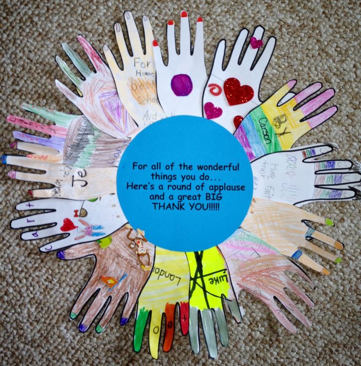 a circle made out of handprints with a poem written in the center and words on it