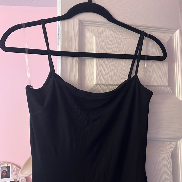 Never Worn Black Stretch Cami Dress, Black Bodycon Tank Top For Night Out, Black Stretch Camisole Mini Dress, Black Bodycon Elegant Tank Top, Elegant Black Bodycon Tank Top, Black Cami Mini Dress, Black Cami Mini Dress For Night Out, Black Camisole Dress For Night Out, Black Bodycon Camisole Dress