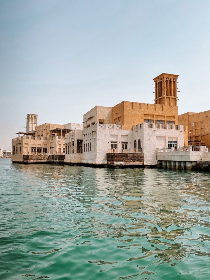 some buildings that are sitting in the water