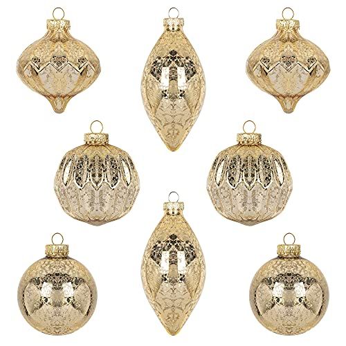 six gold christmas ornaments are arranged in the shape of an ornament, and one is