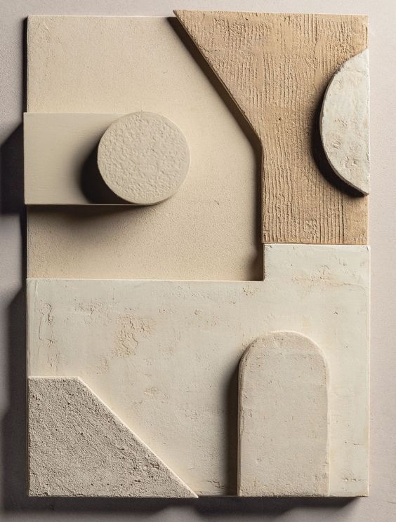 a piece of art that looks like it has been made out of concrete and cement