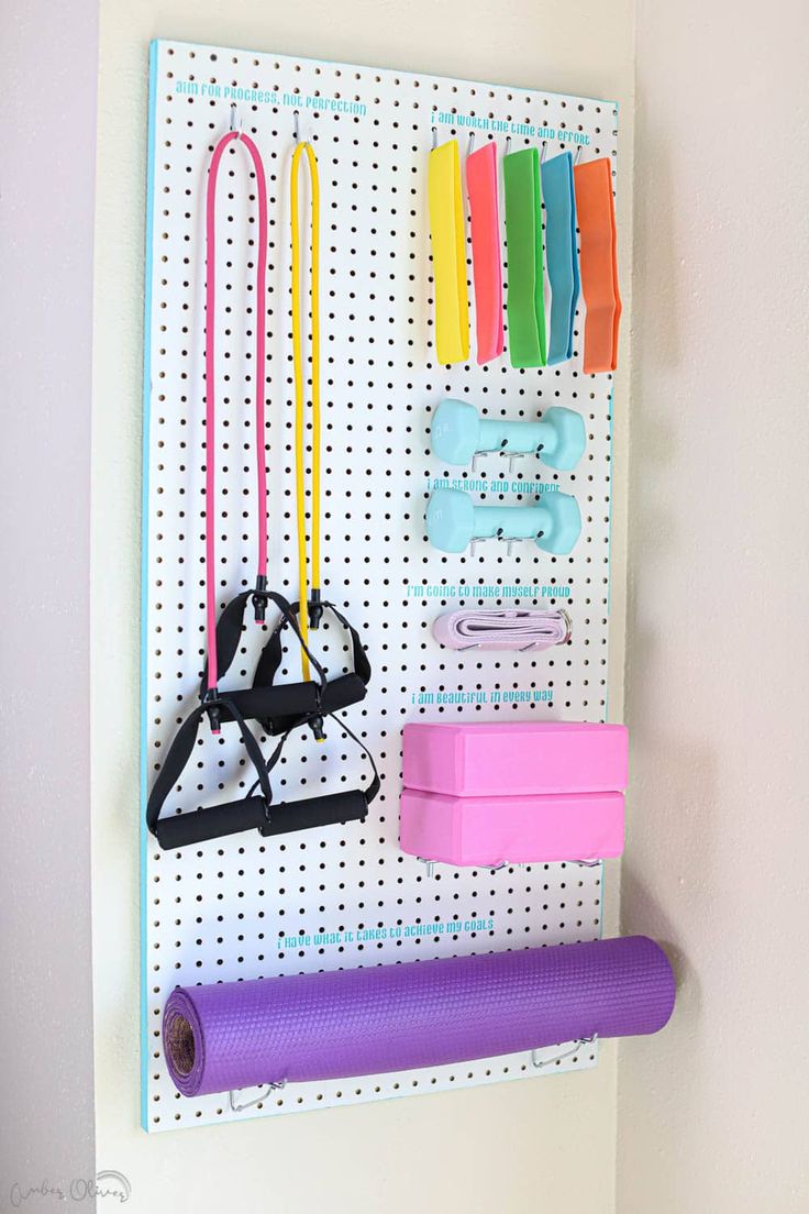 the peg board is organized with colorful items