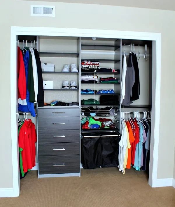 the closet is full of clothes and other things to put in it's storage area