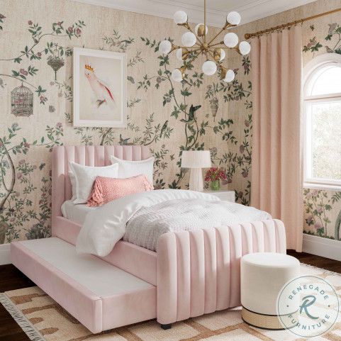 a bedroom with floral wallpaper and a large bed