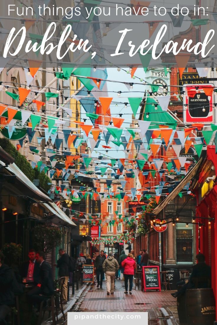 people walking down an alley way in dublin with the words fun things you have to do in dublin, ireland