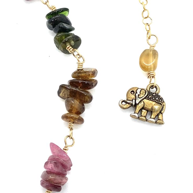 Natural watermelon tourmaline stones necklace with gold filled chain. Gold filled metal does not tarnish. Multicolored gem tourmaline- it brings the mind, body, spirit and soul into wholeness. It is an excellent stone for imagery and promoting dreams, inspiring creativity and enhanced imagination. Spiritual Tourmaline Gemstone Bead Necklaces, Spiritual Tourmaline Gemstone Bead Necklace, Healing Tourmaline Gemstone Necklace, Bohemian Multicolor Tourmaline Necklaces, Tourmaline Pendant Necklaces For Healing, Healing Tourmaline Gemstone Bead Necklaces, Gold Tourmaline Necklace With Natural Stones, Handmade Bohemian Tourmaline Necklace, Bohemian Tourmaline Pendant Necklace