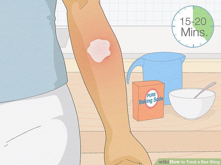 a woman with her arm on the counter next to a bowl and measuring tape,