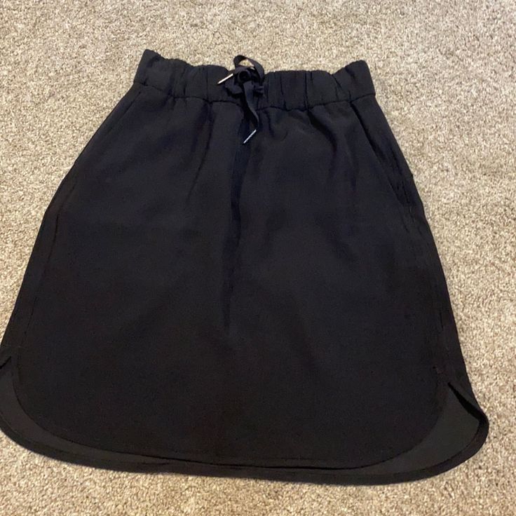 Stretchy Fabric, Adjustable Waist, Brand New Barely Worn, No Rips Or Tears Casual Flowy Skort For Night Out, Casual Black Flowy Skirt, Black Skirt With Pockets For Day Out, Casual Black Pencil Skirt Skort, Casual Black Mini Skirt With Elastic Waistband, Casual Lined Skirt For Night Out, Casual Black Lined Skort, Casual Skort With Lined Skirt For Night Out, Casual Skort For Night Out With Lined Skirt