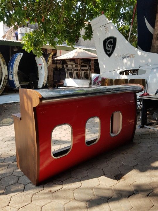 a table made out of an old airplane