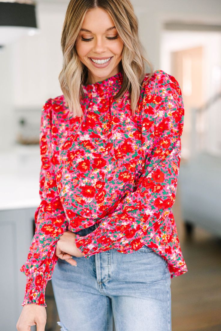 We can't change this blouse nor would we want to! It's gorgeous! That floral print is so vibrant and feminine! This blouse also has a very classic fit that we can't get over! You are going to love wearing this beauty for a day at work or for grabbing lunch with a friend! This blouse features a round neckline, long sleeves, and a floral print. Material has no amount of stretch.Cam is wearing the small. Multicolor Feminine Blouse With Ditsy Floral Print, Feminine Multicolor Floral Print Tops, Fitted Blouse With Ditsy Floral Print For Fall, Feminine Multicolor Tops With Ditsy Floral Print, Feminine Multicolor Ditsy Floral Print Tops, Chic Fitted Rose Print Blouse, Chic Fitted Blouse With Rose Print, Fall Ditsy Floral Print Blouse, Fall Floral Print Red Top