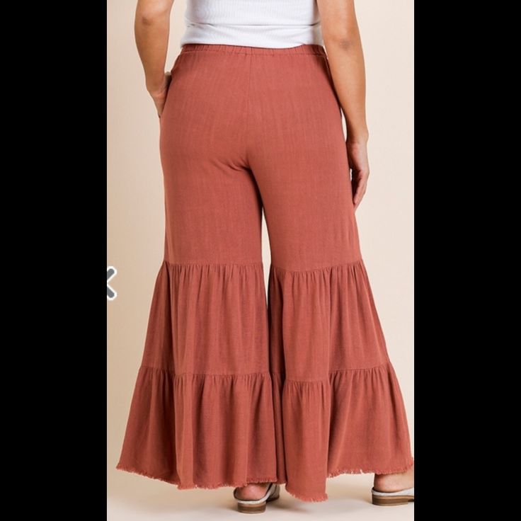 New Umgee Linen/Cotton Blend Pants With Pockets. Color- Canyon Clay Casual Ruffled Trousers, Wide Leg Ruffled Bottoms For Loungewear, Casual Wide Leg Bottoms With Ruffle Hem, Casual Flare Bottoms With Ruffles, Casual Ruffled Flare Bottoms, Casual Ruffled Relaxed Fit Pants, Casual Wide-leg Pants With Ruffles, Fall Loungewear Bottoms With Ruffles, Summer Wide Leg Bottoms With Ruffle Hem