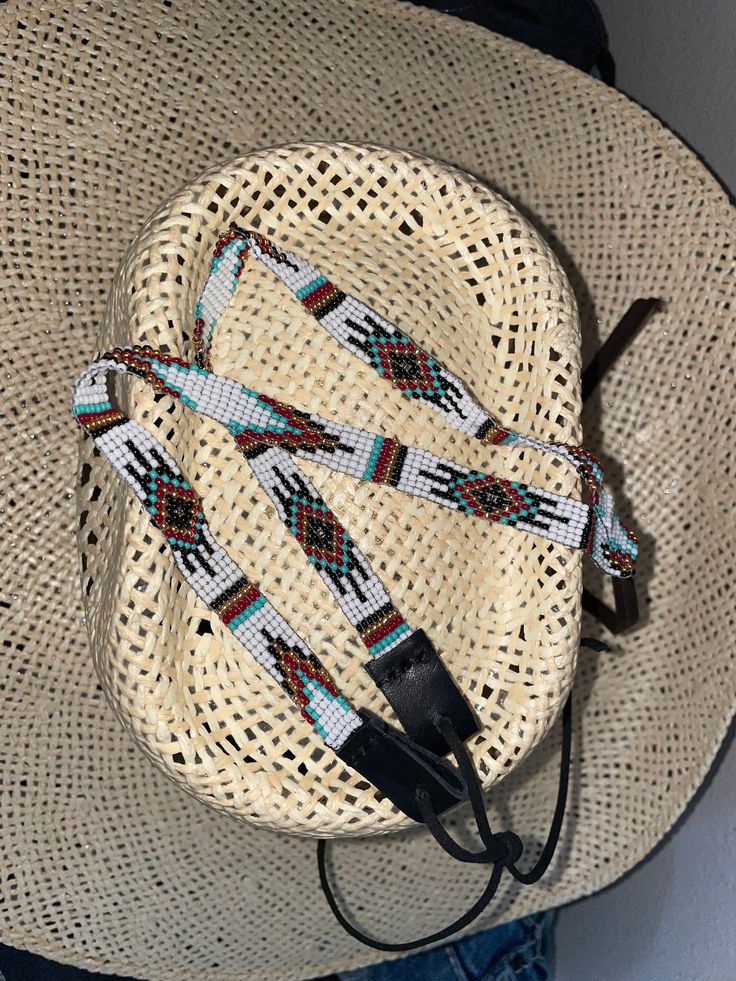 "1/4\" wide aztec hatband .All bead work is beaded with 10lb extreme braided nylon line.  All hat bands are finished at 23\" with glued than sewed down leather ends and an adjustable leather tie.  These hatbands make the perfect edgy new accessory while at work or while horseback riding. Made in Montana. Would make the perfect gift. Ready to ship!" Beaded Hat Band Patterns, Aztec Hat, Western Things, Southern Jewelry, Beading Designs, Beaded Hat Bands, Band Ideas, Bead Creations, Hat Bands