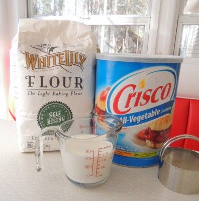 the ingredients to make an ice cream dessert are displayed in front of a windowsill