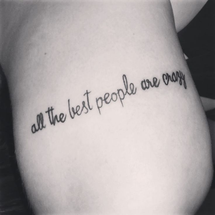 a person with a tattoo that says, all the best people are crazy