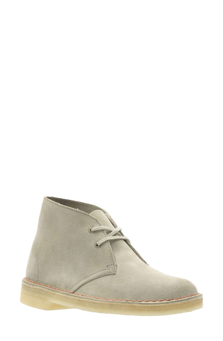 Inspired by the footwear worn by British officers in World War II, this iconic lace-up ankle boot is fashioned from soft suede and grounded by a natural crepe sole for flexible cushioning. 1" heel (size 8.5) 4" shaft Lace-up style Suede upper/leather lining/crepe sole Imported Women's Shoes Beige Lace-up Boots With Rubber Sole, Casual Suede Lace-up Boots With Leather Sole, Beige Desert Boots With Textured Sole And Round Toe, Beige Desert Boots With Textured Sole, Beige Desert Boots With Stitched Sole And Round Toe, Beige Desert Boots With Stitched Sole, Suede Lace-up Boots With Rubber Sole And Plain Toe, Beige Suede High-top Lace-up Boots, Beige High-top Suede Lace-up Boots