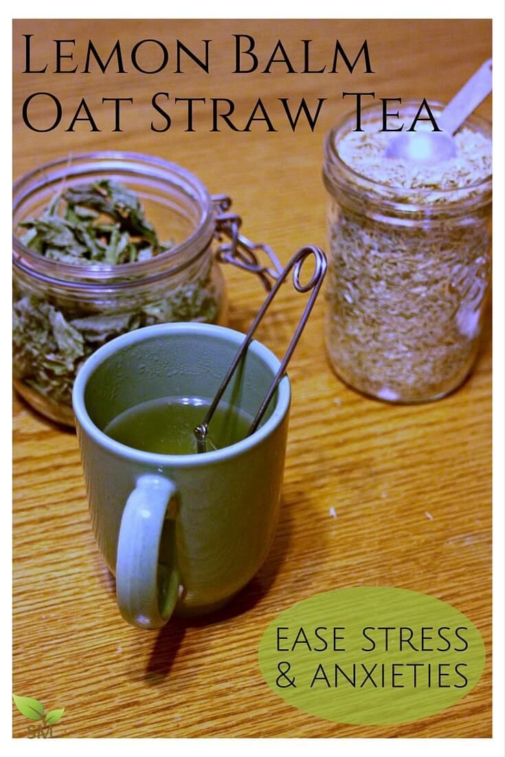 lemon balm oat - straw tea in a mug with spoons on the table