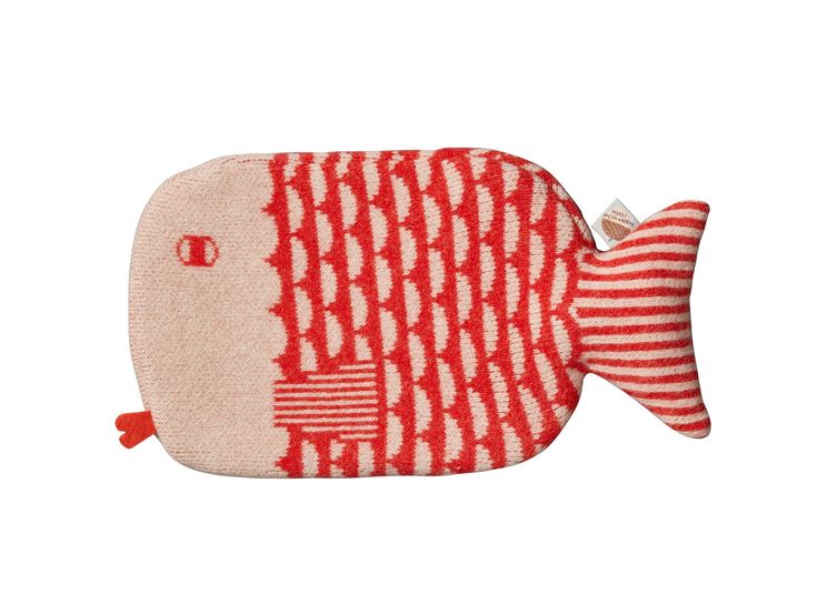 a red and white fish shaped pillow on a white background