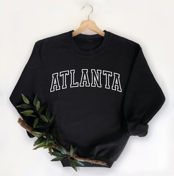 "Atlanta Sweatshirt, Atlanta Hoodies, Collegiate Text, Georgia Long Sleeves Shirt, Atlanta GA Crewneck Sweater, University State Inspired ----------- How to Order Your Cutom Design T-shirt ---------- * Choose your t-shirt color * Choose your size * PLEASE make sure all your order's steps ---------- Product ---------- * 4.2 oz., 100% airlume combed and ringspun cotton, 32 singles * 32 singles Athletic Heather and Black Heather are 90/10 airlume combed and ringspun cotton/polyester Ash is 99/1 airlume combed and ringspun cotton/polyester * double-needle stitching throughout * seamless collar * heat transfer label * taped shoulder-to-shoulder Tell us what you want in the Message Box that's hidden in the Review Page during Checkout. Please use \"ADD MESSAGE TO SELLER\" icon before you checkout Montana Sweatshirt, Lover Sweatshirt, Nurse Sweatshirt, Bachelorette Parties, Mom Sweatshirt, Halloween Sweatshirt, Halloween Women, Atlanta Ga, Birthday Anniversary