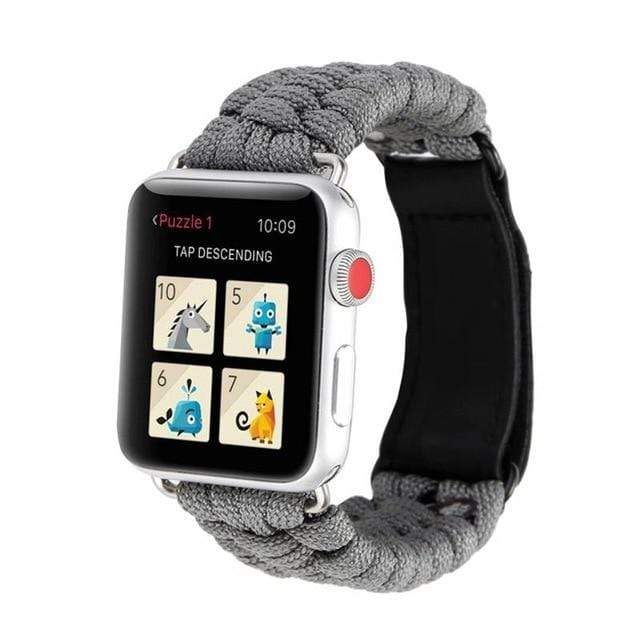 an apple watch with a rope bracelet around it's wrist and buttons on the screen