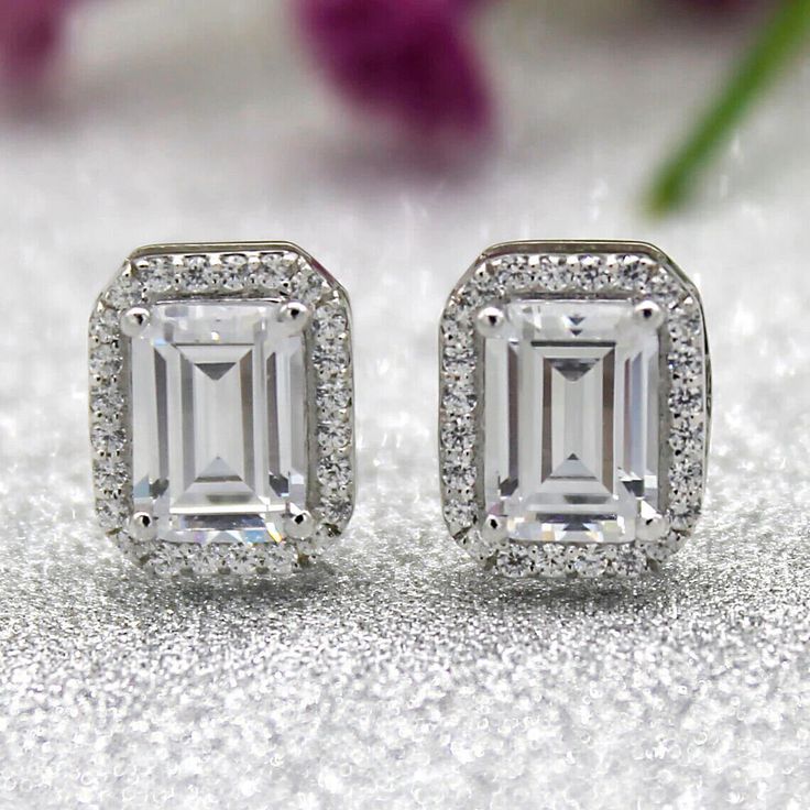 Emerald Cut Moissanite Stud Engagement Earrings 14K White Gold Handmade Minimalist GRA Certified VVS Diamond Classic Women Earrings For Gift ➤ 𝐓𝐲𝐩𝐞: 𝐌𝐨𝐢𝐬𝐬𝐚𝐧𝐢𝐭𝐞 𝐃𝐢𝐚𝐦𝐨𝐧𝐝 ➤ 𝐂𝐚𝐫𝐚𝐭 𝐰𝐞𝐢𝐠𝐡𝐭:- 2.40 Tcw ➤ 𝐃𝐢𝐚𝐦𝐨𝐧𝐝 𝐒𝐡𝐚𝐩𝐞:- Round & Emerald ➤ 𝐃𝐢𝐚𝐦𝐨𝐧𝐝 𝐂𝐨𝐥𝐨𝐫: DEF ➤ 𝐂𝐥𝐚𝐫𝐢𝐭𝐲: VVS ➤ 𝐏𝐨𝐥𝐢𝐬𝐡: Excellent  ➤ 𝐒𝐲𝐦𝐦𝐞𝐭𝐫𝐲: Excellent ➤ 𝐇𝐚𝐫𝐝𝐧𝐞𝐬𝐬: 9/10 ➤ 𝐃𝐢𝐚𝐦𝐨𝐧𝐝 𝐓𝐞𝐬𝐭𝐞𝐫 𝐏𝐚𝐬𝐬 : Yes ➤ 𝐌𝐞𝐭𝐚𝐥 𝐓𝐲𝐩𝐞: 925 Silver/10K/14K/18K Gold ➤ 𝐌𝐞𝐭𝐚𝐥 𝐖𝐞𝐢𝐠𝐡𝐭: 4.50 To 7.32 Grams 𝐂𝐮𝐬𝐭𝐨𝐦𝐢𝐳𝐚𝐭𝐢𝐨𝐧 𝐒𝐞𝐫𝐯𝐢𝐜𝐞𝐬 ➺ I'm glad to make custom jewelry using this diamond within 5-7 business working days. please feel free to contact me for more. ➺ If you have your Special Requirement or Customized Bulk Orders or wanted an Types Of Diamond Cuts, Minimal Earrings Studs, Engagement Earrings, Halo Stud Earrings, Vvs Diamond, Minimalist Earrings Studs, Emerald Cut Moissanite, Simple Stud Earrings, Womens Earrings Studs