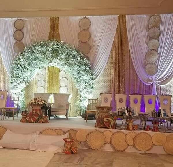 a decorated stage set up for a wedding reception