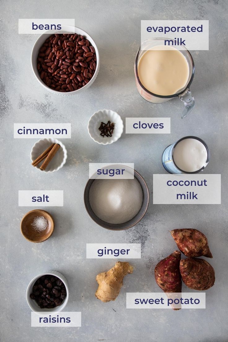 the ingredients to make an ice cream smoothie are shown in small bowls on a gray surface