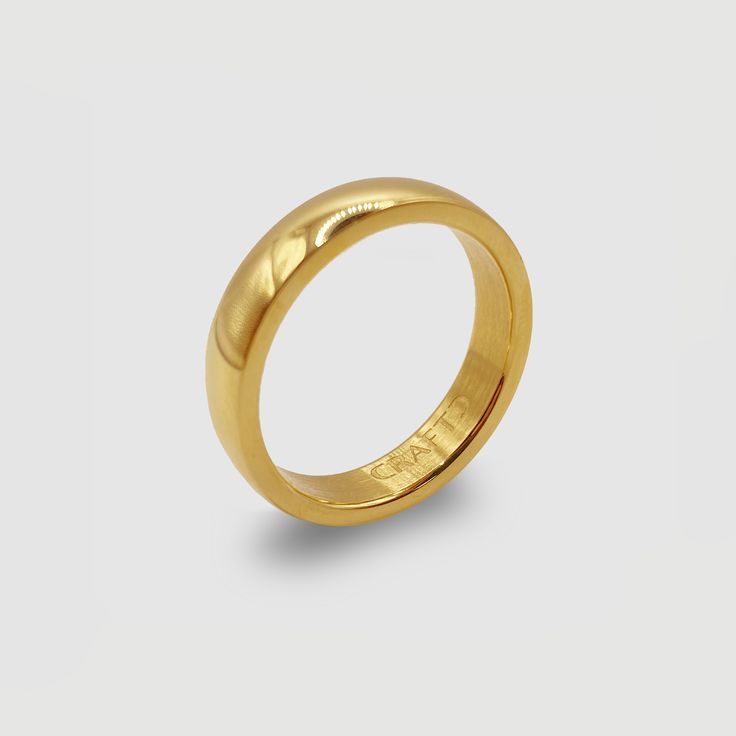 Timeless style, made for daily wear. With a precise tapered band and refined gold polish finish, wear this piece all day, everyday. It boasts ultra durable, scratch resistant plating and a premium brushed interior for added comfort—a true investment for decades to come. Pair with other Minimals for an elevated look with zero effort.✓ 18K Gold & 316L Stainless Steel✓ Water, Heat, Sweat Resistant ✓ No Discolouring or Tarnishing✓ Hypoallergenic (No Green Skin) Model is 5.11" and wears size M (Mediu Classic Rings With Smooth Finish For Everyday, Classic Gold Dome Ring For Everyday, Classic Everyday Rings With Smooth Finish, Everyday Gold Signet Ring With Smooth Bezel, Classic Anniversary Rings With Brushed Finish, Classic Anniversary Ring With Brushed Finish, Classic Rings With Brushed Finish For Formal Occasions, Classic Gold Bands For Everyday, Modern Gold Bands For Everyday