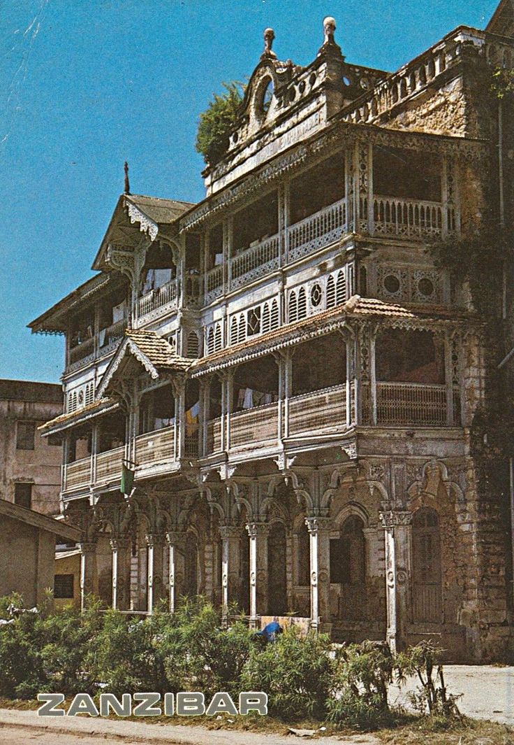 an old building with many balconies on it