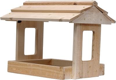 a wooden bird house with the roof open