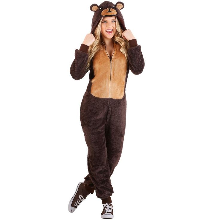 The Fun Costumes Brown Bear Onesie Costume for Women and MenIt's time to take a walk on the wild side as a cute and cuddly grizzly with this Adult Brown Bear Costume! The onesie costume is designed as microfiber faux fur jumpsuit that features a flip up hood. The hood has character details complete with a stuffed snout and appliqued facial features. A plush tail is attached at the back of the suit to give you the full bear look. With a zip up front and comfy rib knit cuffs at the wrist and ankle Adult Onesie Costume, Bear Onesie, Poke The Bear, Jumpsuit Costume, Dream Bigger, Onesie Costumes, Animal Onesie, Bear Costume, Bear Brown