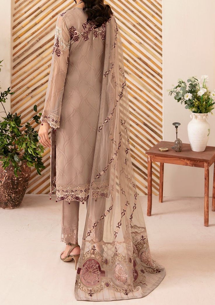 Introducing our Chiffon collection Rangoon by Ramsha, designed to make you look and feel your best These pieces will add a touch of class and elegance to your wardrobe. This collection is a beautiful collection of ensembles offering versatile compositions for the latest festive wardrobe requirements. Embroidered Chiffon Front With Sequence. Embroidered Chiffon Back and Sleeves. Embroidered Organza Lace. Embroidered Organza Ghera and Trouser Lace. Embroidered Net Dupatta. Raw Silk Trouser. Color: There might be slight color variation due to lighting and flashes while the photo shoot. The color may also vary because of different screen resolutions. Wash Care: Dry Clean Only. Batik Print Dress, Lehenga Jewellery, Pakistani Designer Clothes, Saree Sale, Chiffon Sleeves, Organza Sleeves, Lehenga Style, Chiffon Collection, Jamdani Saree