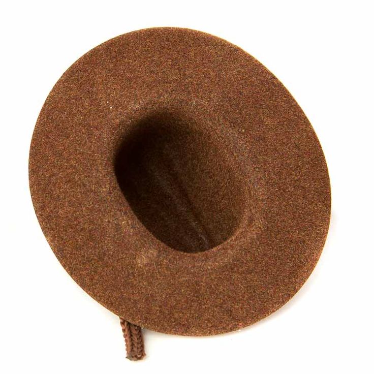 Mini Brown Flocked Cowboy Hat. This Mini Brown Flocked Cowboy Hat is a darling accessory fit for a western look! The small cowboy hat makes for a darling placeholder or favor for western-themed parties, barbecues, and weddings. Utilize it as a gift package decoration for those friend and family cowboys, western lovers, and horse lovers!    This precious hat is covered in rich velveteen coating and its crown is detailed with matching shiny rope trim. Brown Felt Hat Band For Country Events, Brimmed Brown Boater Hat For Country Events, Brown Brimmed Boater Hat For Country Events, Adjustable Brown Boater Hat For Country Events, Western Brown Felt Hat Bands, Brown Mini Hat With Short Brim For Rodeo, Brown Brimmed Mini Hat For Rodeo, Country Style Brown Mini Hats With Curved Brim, Adjustable Brown Mini Hat For Rodeo