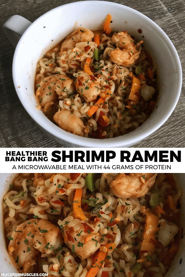 shrimp ramen with carrots and noodles in a white bowl