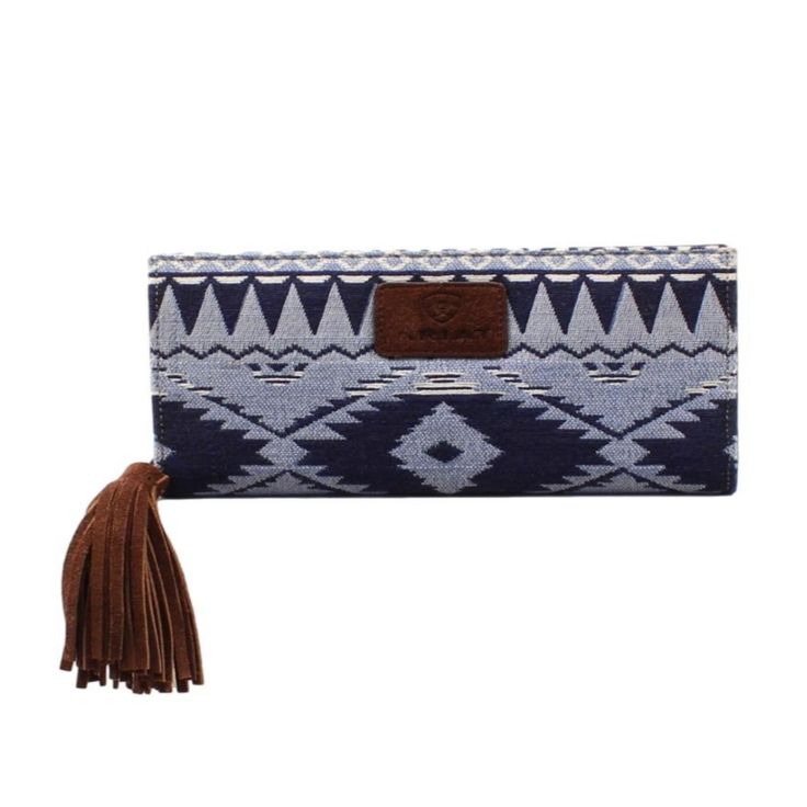 Women's Madison Clutch Blue By Ariat A770009202 Womens Ariat Wallet: Ariat women's Madison collection clutch wallet by M&F Western Products. It has a bright blue southwestern pattern and zip closure with a brown suede fringe tassel.  8 X 4 1/2 X 1 Cowtown Cowboy Outfitters is a family-owned and operated business that has been proudly supplying the very best in western wear since 1958. We aren't big, we aren't corporate, we are a small town business and we care about our customers. Give us the op Ariat Wallet, Womens Ariat, Bling Jacket, Boys Cowboy Boots, Girl Cowboy Boots, Lucchese Boots, Twisted X Boots, Southwestern Patterns, Justin Boots