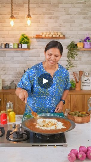 a woman is preparing food on the stove