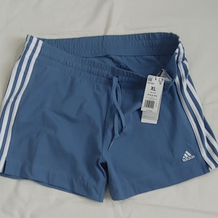 Women Shorts Blue And White Size Xl Made In Indonesia 93% Cotton 7% Spandex Adidas Cotton Bottoms With Built-in Shorts, Adidas Sportswear Shorts For Summer, Adidas Summer Sportswear Shorts, Blue Adidas Cotton Activewear, Adidas Blue Shorts With Three Stripes, Adidas Blue Workout Shorts, Stretch Blue Bottoms With Three Stripes, Stretch Summer Shorts With Three Stripes, Stretch Shorts With Three Stripes