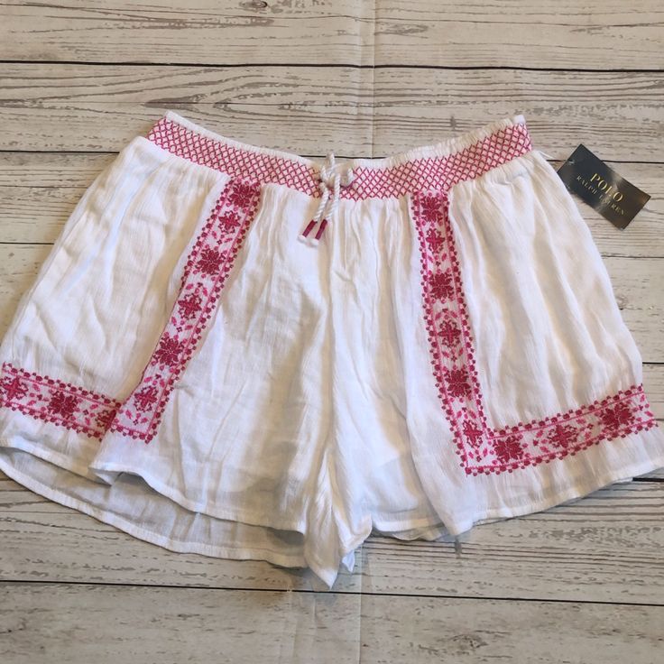 Nwt White Ralph Lauren Shorts With Pink Design. 55% Cotton/45% Viscose. Size 16 Ralph Lauren Casual Bottoms For Spring, Casual Ralph Lauren Bottoms For Spring, Ralph Lauren Relaxed Fit Bottoms For Summer, Ralph Lauren Casual Spring Bottoms, Pink Letter Print Shorts, Ralph Lauren Summer Bottoms Relaxed Fit, Summer Ralph Lauren Relaxed Fit Bottoms, Casual White Ralph Lauren Bottoms, Pink Cotton Shorts With Letter Print