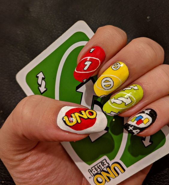 50 Hottest Back to School Nail Ideas that Slay 90s Aesthetic Nail Art, Uno Nails Art Designs, Nails Characters Art Designs, Tv Show Nail Art, Pop Culture Nail Art, Emoji Nails Design, M&m Nails, Adventure Time Nail Art, Uno Nails