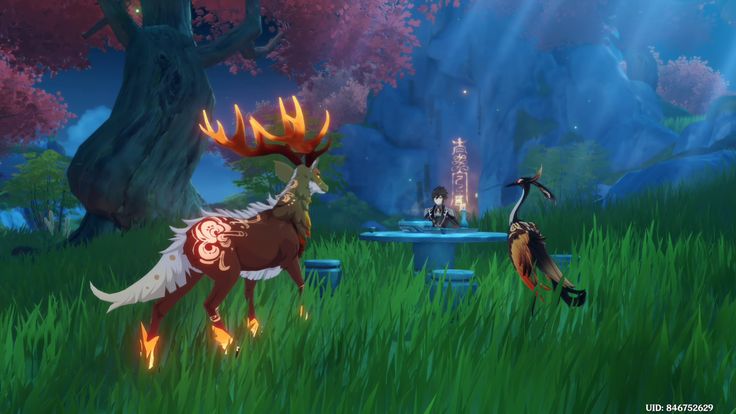 an animated image of two deers in the grass with fire on their antlers