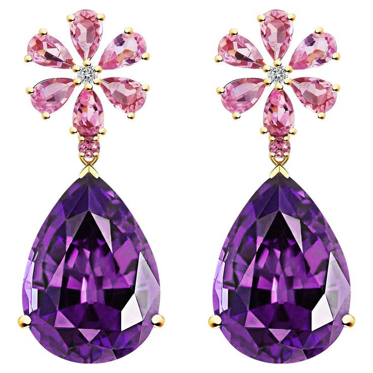 Experience the enchanting allure of Nina Zhou's Pink Sapphire Diamond Blossom Amethyst Drop Earrings, expertly crafted in radiant yellow gold. Each earring begins with a delicate blossom, intricately formed by pink sapphires that capture the essence of spring's first blooms. At the center of each flower, a cluster of fine diamonds adds a brilliant sparkle that beautifully complements the soft hues of the sapphires. Suspended elegantly below is a luxurious amethyst drop, its deep purple tones exu Luxury Purple Fine Jewelry Earrings, Luxury Pink Amethyst Jewelry, Pink Gemstone Earrings With Flower Shape, Purple Flower Shaped Gemstone Jewelry, Pink Gemstone Flower-shaped Earrings, Purple Diamond, Purple Tones, Christmas Hair, Amethyst Purple