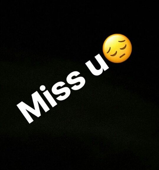 the message miss u is written in white on a black background with an emoticive smiley face