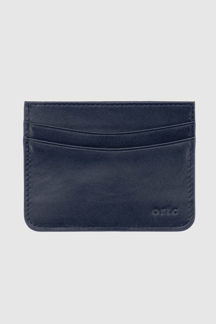 Leather cardholder Navy blue leather with striped interior lining 5 card sleeves Debossed ortc logo Comes in navy blue gift box Size: [W] 10.5cm [H] 8cm Handmade Designed in Australia. Made in China Striped Interior, Leather Cardholder, Card Sleeves, Leather Card Holder, Blue Gift, No Show Socks, Card Holder Leather, Clothing Co, Online Accessories