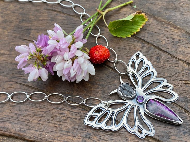 Purple Butterfly Necklace. Artisan Sterling Silver, Trilobite, Sugilite, Amethyst. Raw, Primitive, Organic, Tribal, Moth, Boho, Fossil. This Purple Butterfly Pendant was made with love by yours truly - as part of my Purple Nebula collection - with sterling silver, fine silver, purple South African sugilite cabochon cut by talented lapidary artists from the nice Etsy store called ColoradoGemworks out of Boulder, CO, a baby Trilobite fossil from the nice Etsy store called ArtifactsandFossils out o Purple Nebula, Corning Ny, Trilobite Fossil, Purple Butterfly, Butterfly Necklace, Butterfly Pendant, Amethyst Stone, South African, Fine Silver