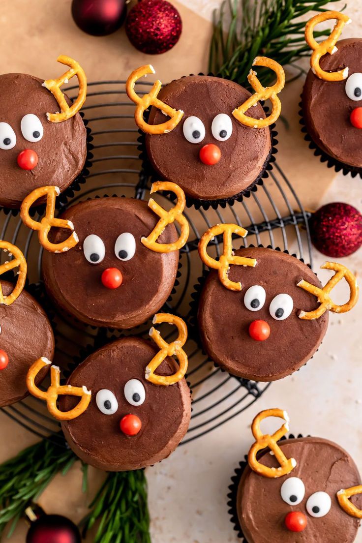 chocolate cupcakes decorated to look like rudolph the reindeer