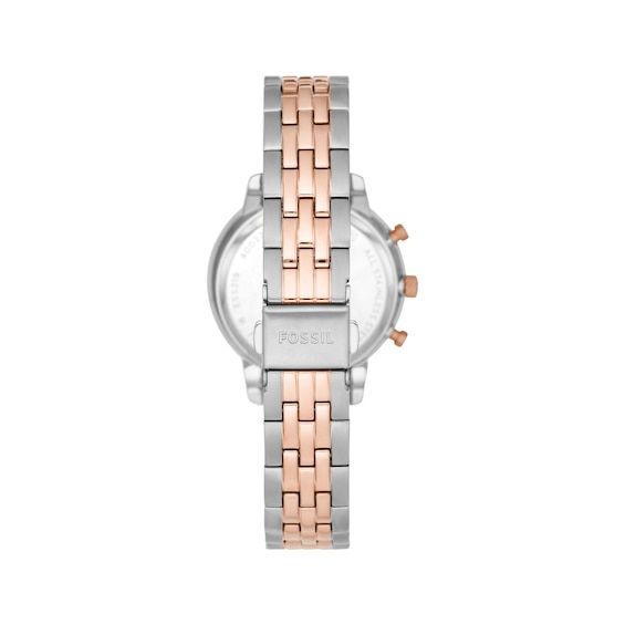 A timeless watch inspired by architecture with its proportions and symmetry, the Neutra from Fossil can be dressed up or down. With a 36mm silver- and rose gold-tone stainless steel case, this chrono design features a mother-of-pearl dial, sparkling rose gold-tone bezel, date display and mineral crystal The two-tone stainless steel bracelet secures with a push-button fold-over clasp Water-resistant to 50 meters Timeless Rose Gold Chronograph Watch With Metal Dial, Elegant Rose Gold Chronograph Watch With Metal Dial, Modern Rose Gold Chronograph Watch With Subdials, Modern Rose Gold Chronograph Watch For Formal Occasions, Modern Rose Gold Watch Accessories With Subdials, Modern Rose Gold Watch With Analog Display, Modern Rose Gold Watches With Subdials, Modern Rose Gold Diamond Watch With Subdials, Timeless Watch