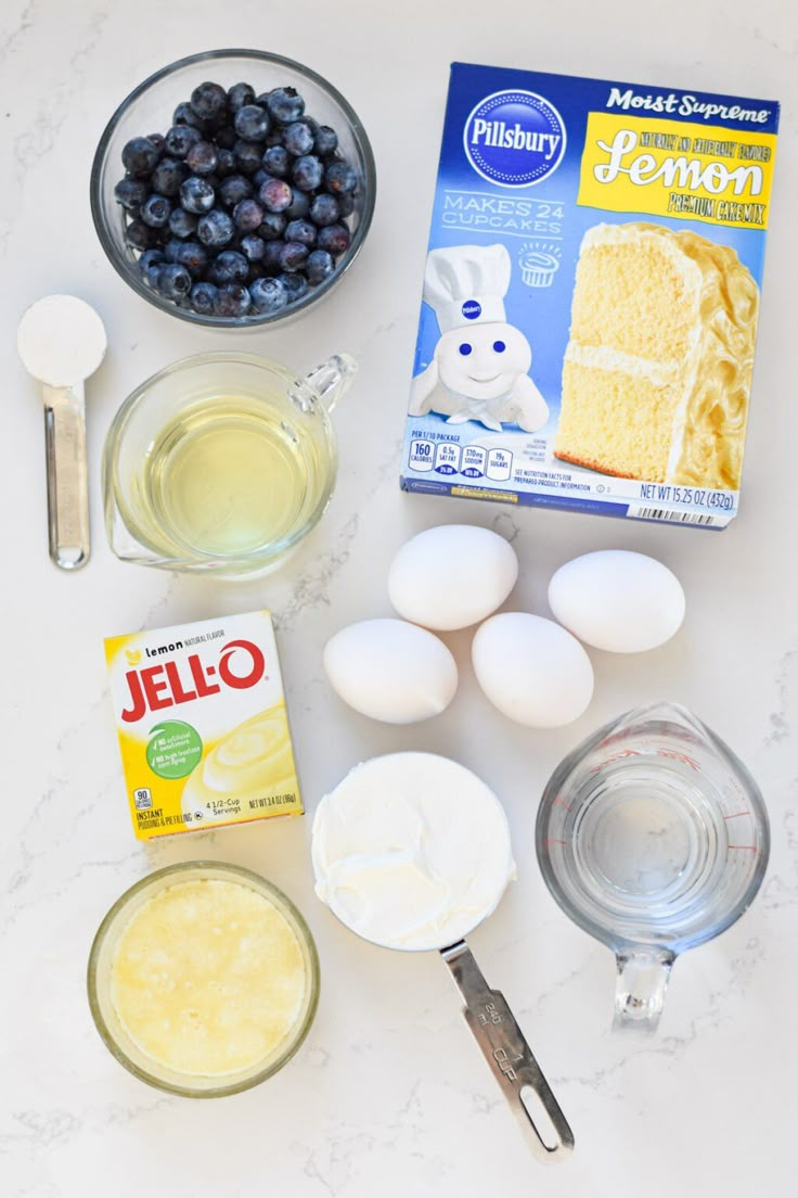 ingredients to make blueberry cake laid out on a counter